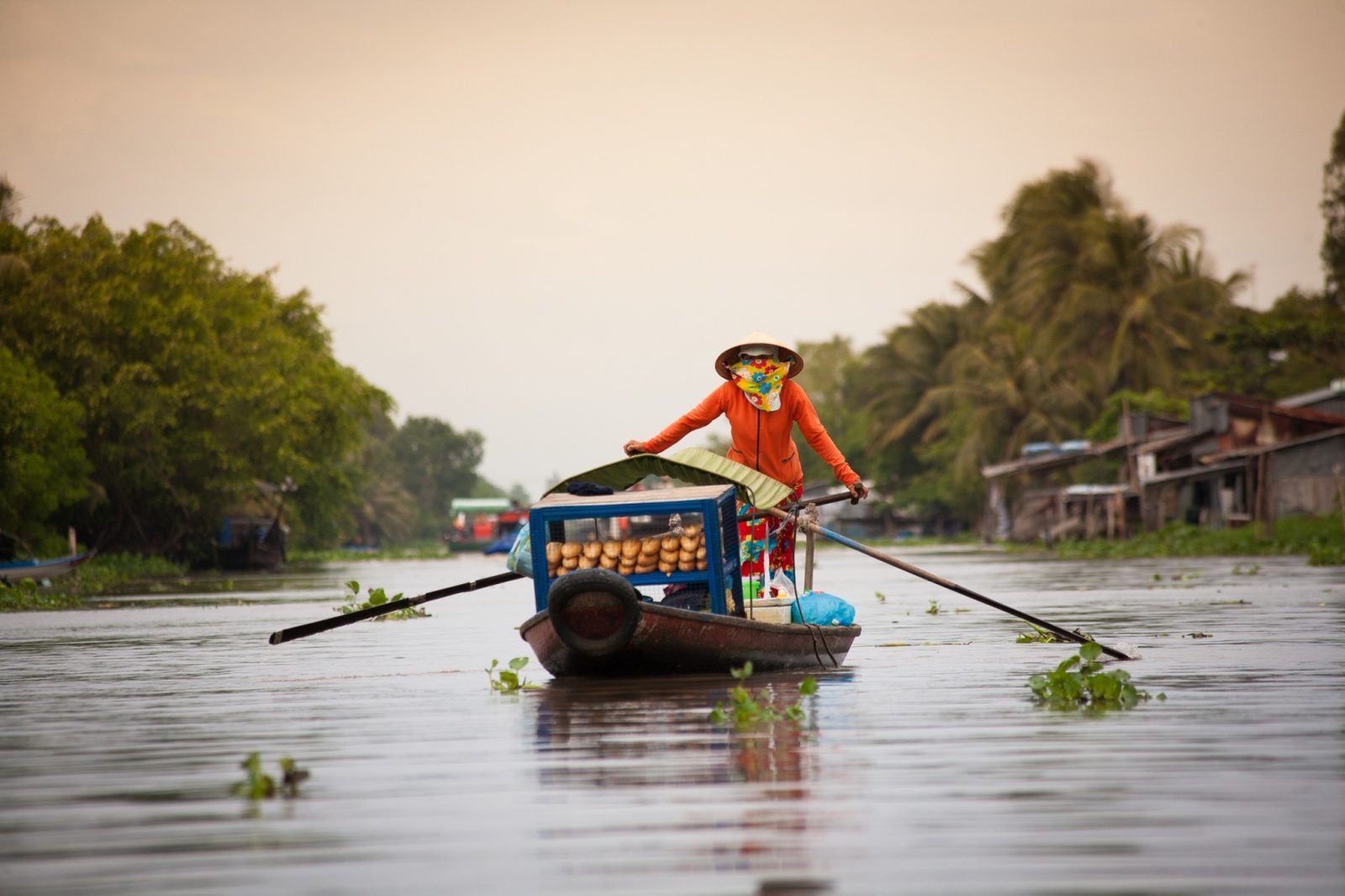 Rowing your boat in Mekong Delta
